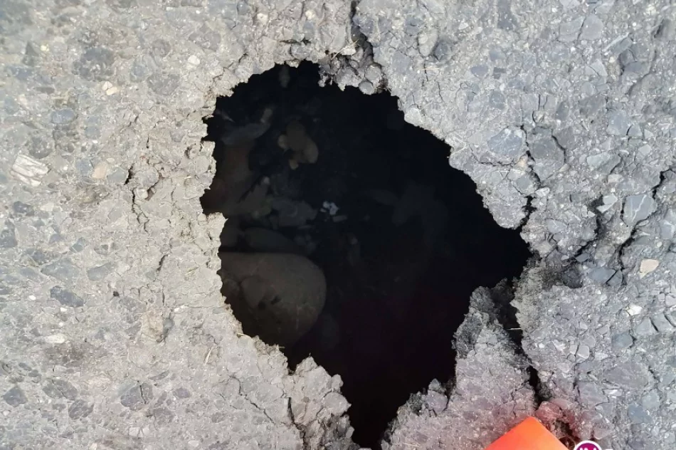 Policja 'pilnuje' dziury, drogowcy nie kwapią się by ją załatać - zdjęcie 2