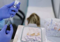 Padł kolejny rekord zakażeń. Błąd w systemie rejestracji na szczepienia - zdjęcie główne