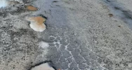 Kałuże zasłaniają ogromne dziury. Mieszkańcy liczą na remont - zdjęcie 5