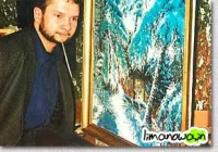 Maluje ustami i stopami - zdjęcie główne